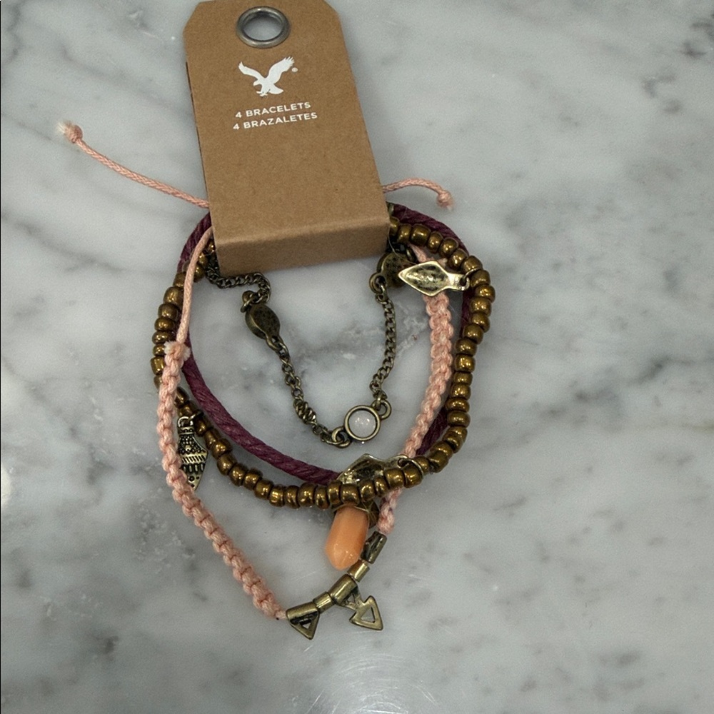 American Eagle Outfitters Pink and Bronze Multi-Strand Charm Bracelet Set